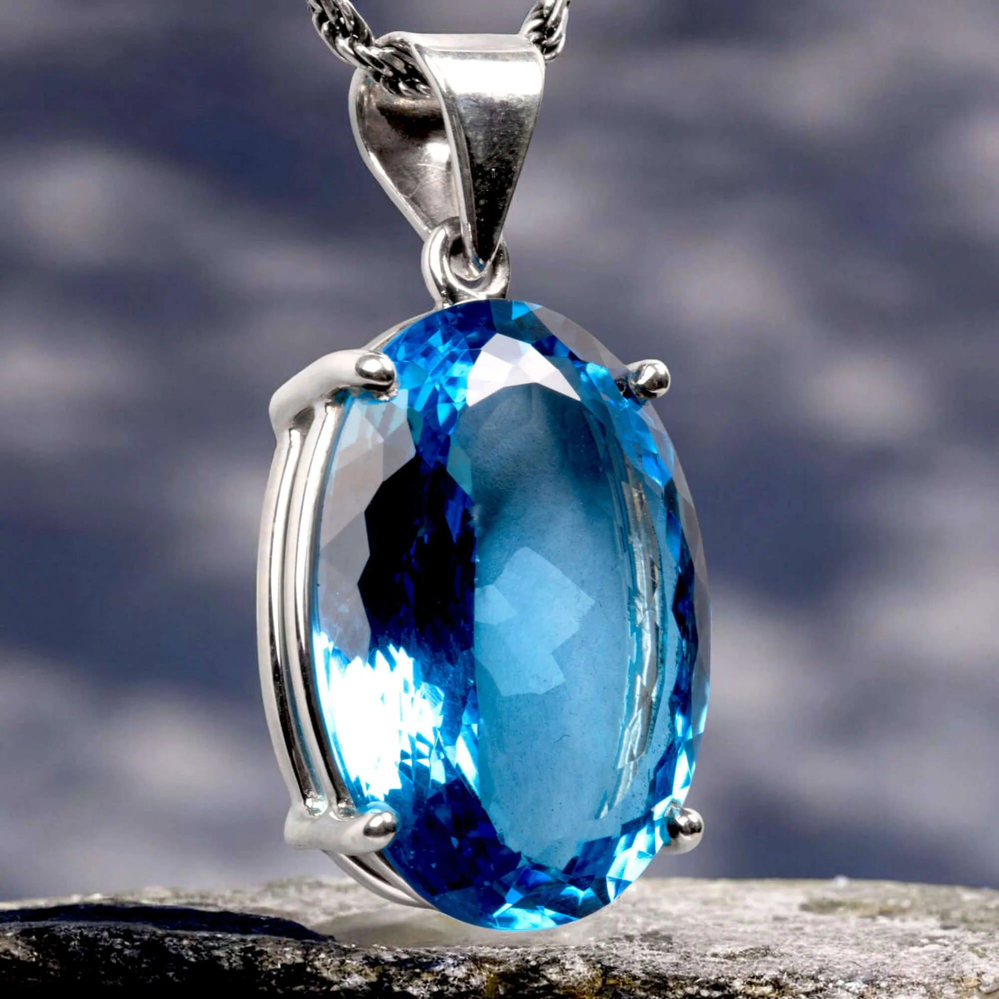 Pendant with Faceted Oval Swiss Blue Topaz.